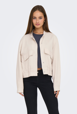 Front image of a model wearing the Jdy karin linen mix short jacket in oat, by brand Jacqueline de yong