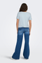 Back image of a model wearing the Jdy sissy s/s vneck top in light blue, by brand Jacqueline de yong