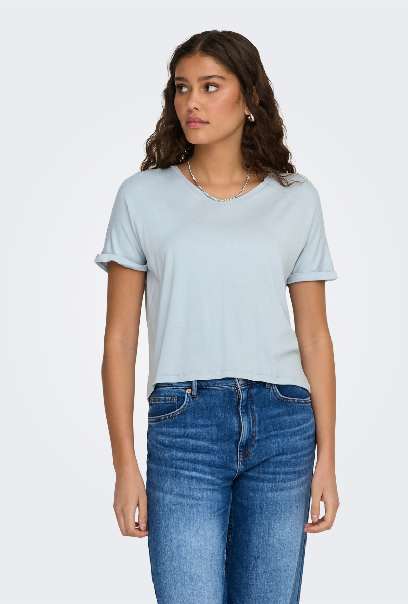 Front image of a model wearing Jdy sissy s/s vneck top in light blue, by brand Jacqueline de yong