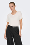 Front image of a model wearing the Jdy sissy s/s vneck top in off white, by brand Jacqueline de yong