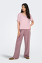 Front image of a model wearing Jdy sissy s/s vneck top in pink, by brand Jacqueline de yong