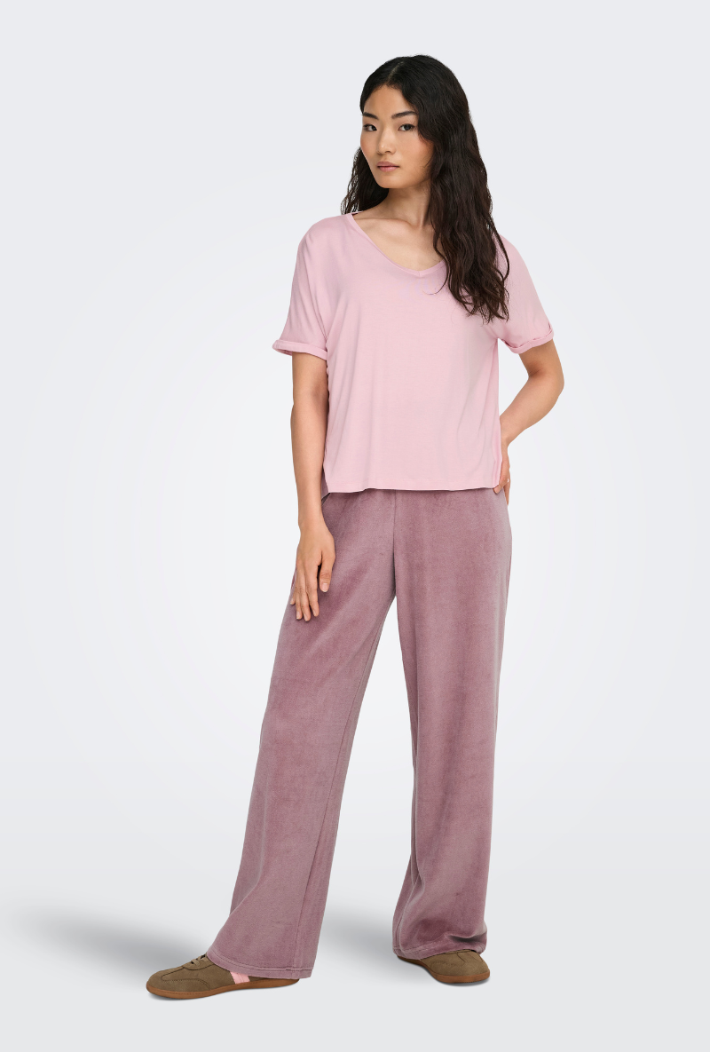 Front image of a model wearing Jdy sissy s/s vneck top in pink, by brand Jacqueline de yong