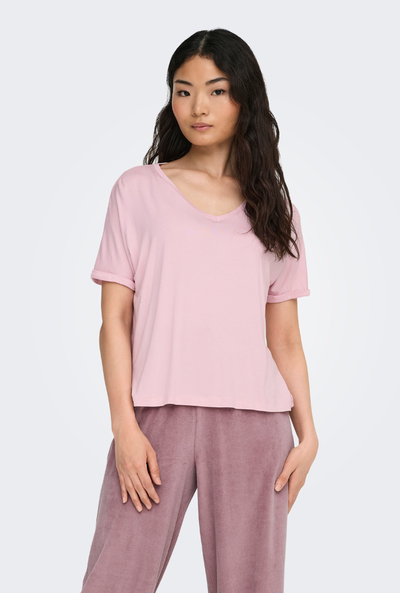 Front image of a model wearing Jdy sissy s/s vneck top in pink, by brand Jacqueline de yong
