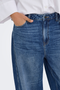 Detail image of a model wearing the Jdy susie mw barrel jeans in denim, by brand Jacqueline de yong