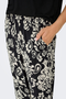 Detail image of a model wearing the Jdy tami hw wide pants in black, by brand Jacqueline de yong