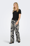 Front image of a model wearing Jdy tami hw wide pants in black, by brand Jacqueline de yong