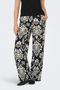Front image of a model wearing the Jdy tami hw wide pants in black, by brand Jacqueline de yong