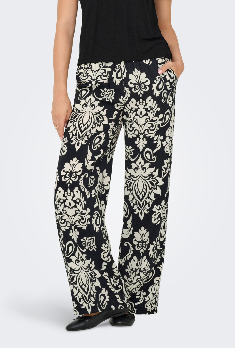 Front image of a model wearing Jdy tami hw wide pants in black, by brand Jacqueline de yong