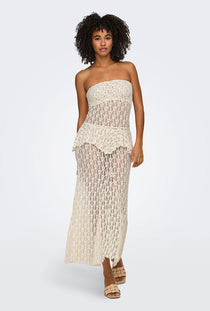 Front image of a model wearing the Laya lace long skirt in cream, by brand Only