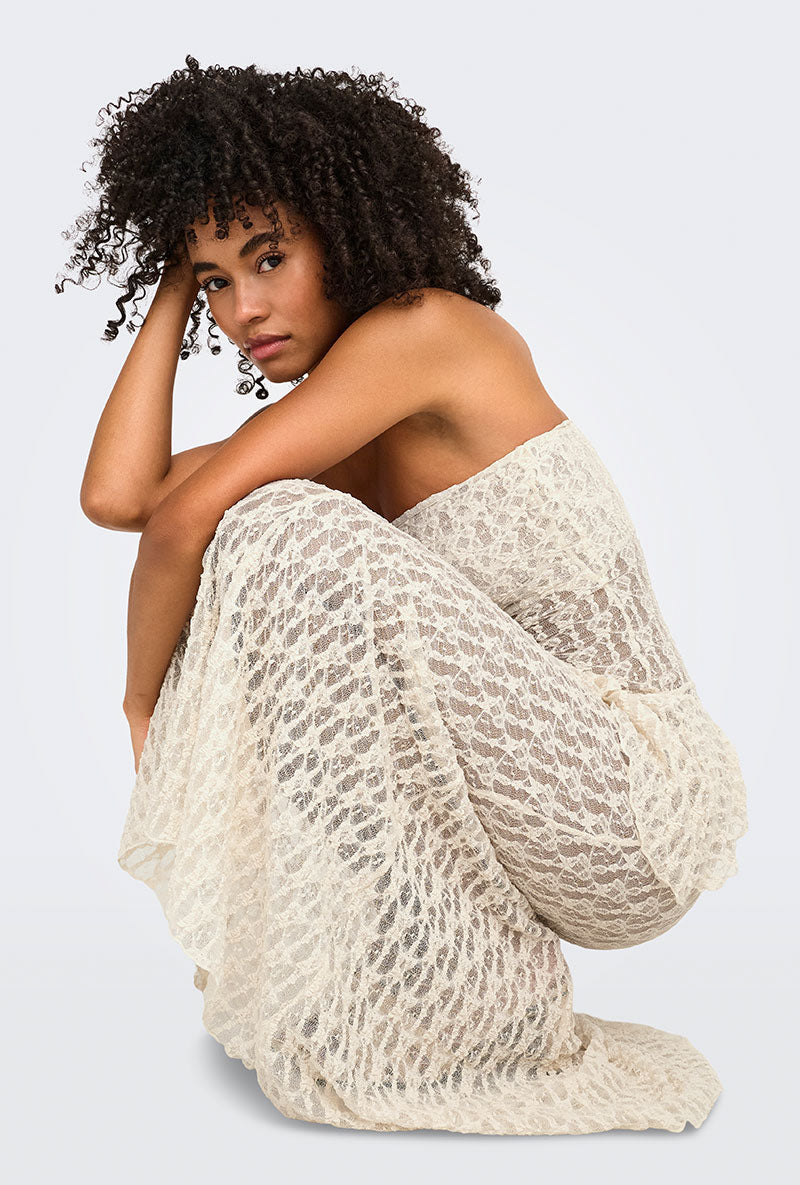 Front image of a model wearing Laya lace long skirt in cream, by brand Only