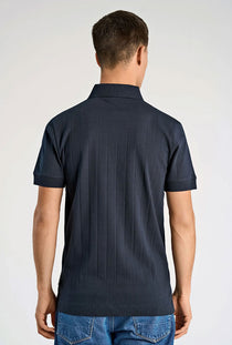 Back image of a model wearing the Needle drop s/s polo in navy, by brand Lindbergh
