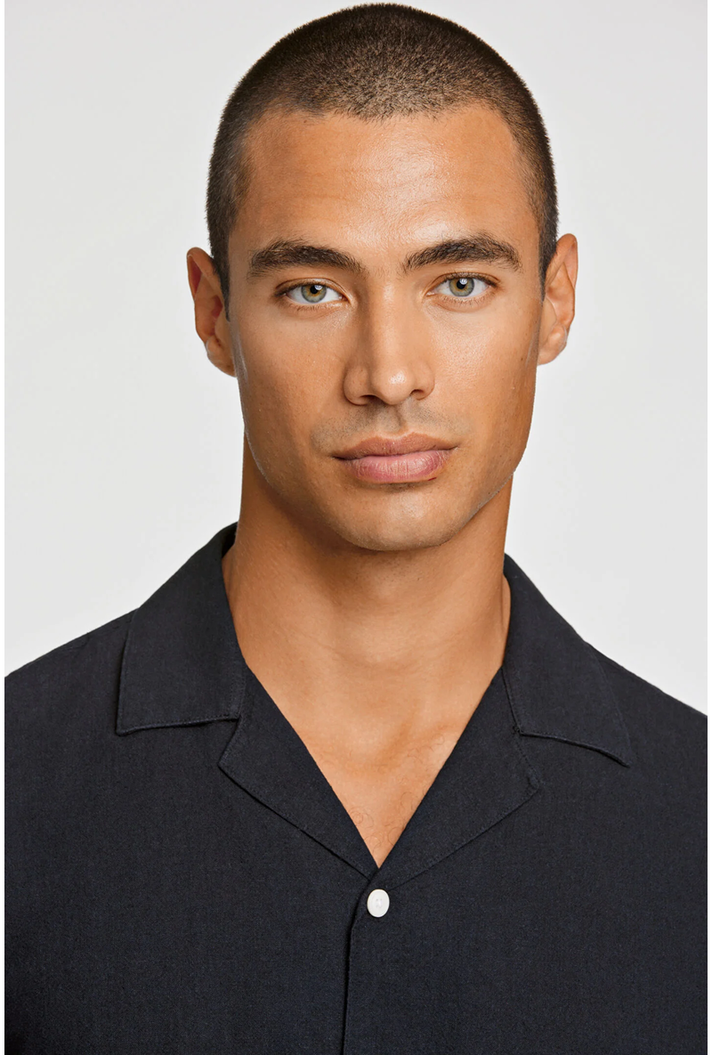 Front image of a model wearing Casual linen blend resort shirt in black, by brand Lindbergh