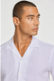 Front image of a model wearing the Casual linen blend resort shirt in white, by brand Lindbergh