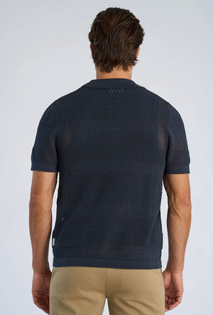 Back image of a model wearing the Crochet s/s shirt in navy, by brand Lindbergh