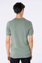 Back image of a model wearing the Ecovero s/s knit polo in light green, by brand Lindbergh