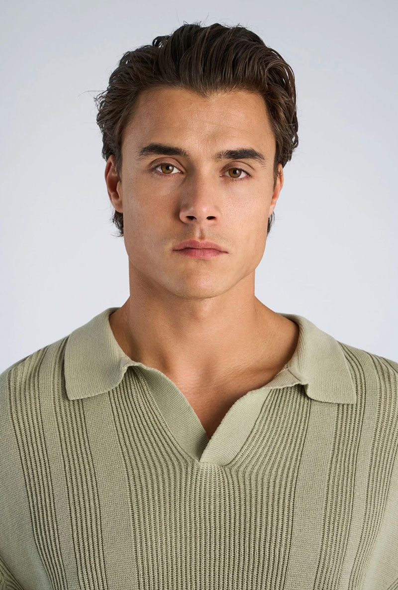 Front image of a model wearing Knitted s/s polo in light green, by brand Lindbergh