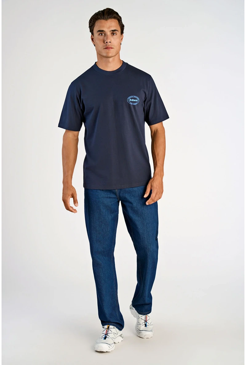 Front image of a model wearing Lemon squeezy oversize t in navy, by brand Lindbergh