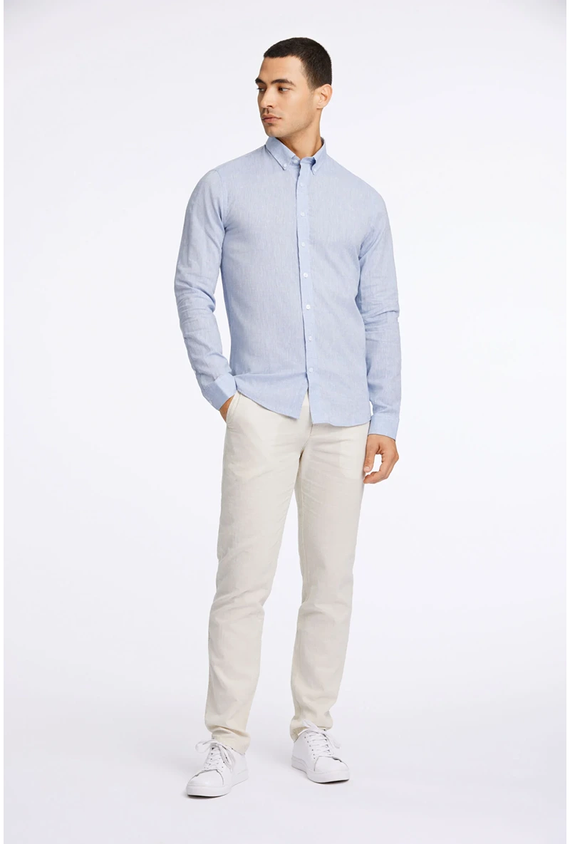 Front image of a model wearing Linen/cotton ls shirt in blue, by brand Lindbergh
