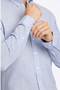 Front detail image of a model wearing the Linen/cotton ls shirt in blue, by brand Lindbergh