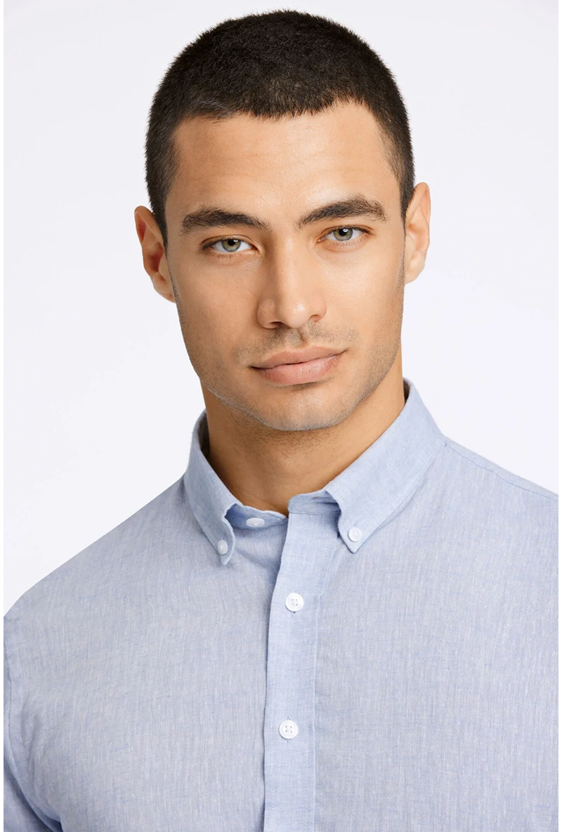 Front image of a model wearing Linen/cotton ls shirt in blue, by brand Lindbergh
