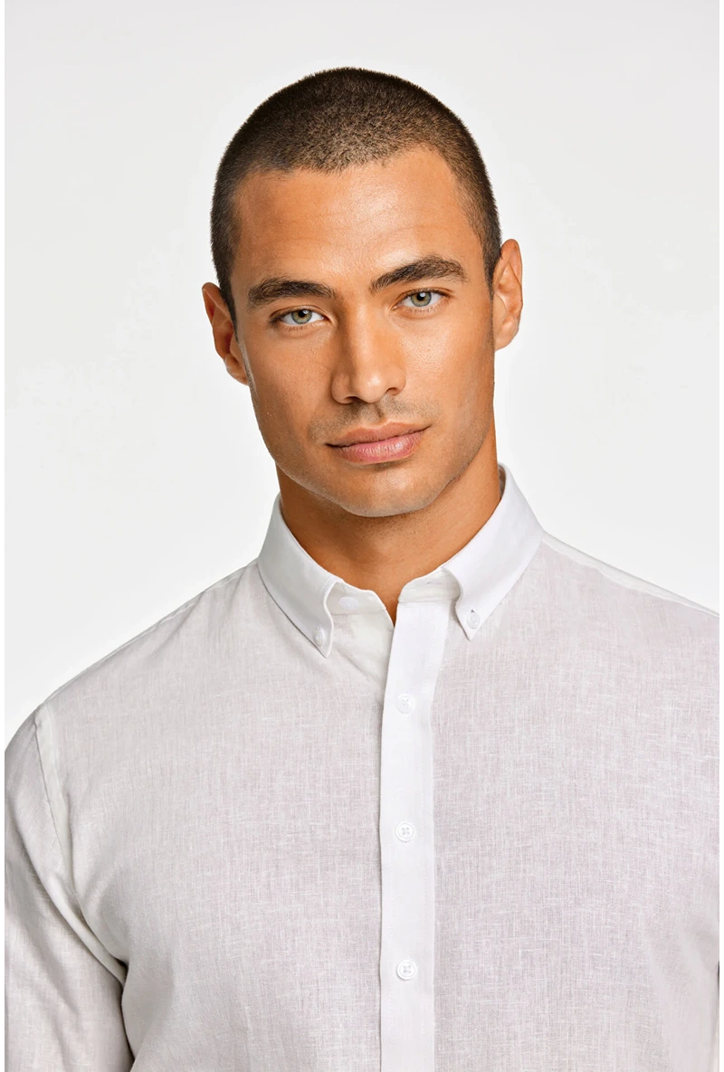 Front detail image of a model wearing Linen/cotton ls shirt in white, by brand Lindbergh