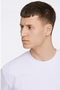 Front image of a model wearing the Oversized s/s t in white, by brand Lindbergh