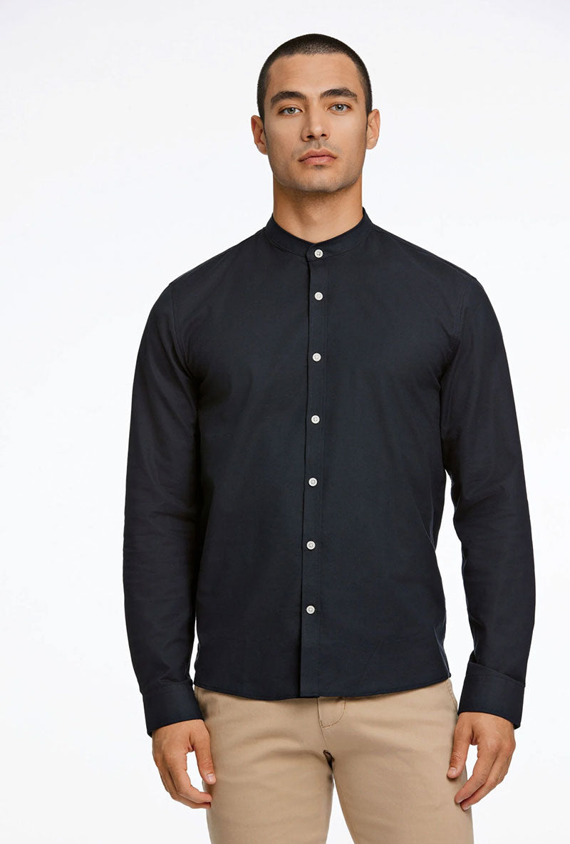 Front image of a model wearing Lindbergh oxford superflex l/s shirt in black, by brand Lindbergh