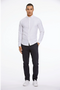 Front image of a model wearing the Oxford superflex l/s shirt in white, by brand Lindbergh