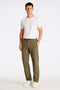 Front image of a model wearing the Relaxed fit linen trousers in khaki, by brand Lindbergh