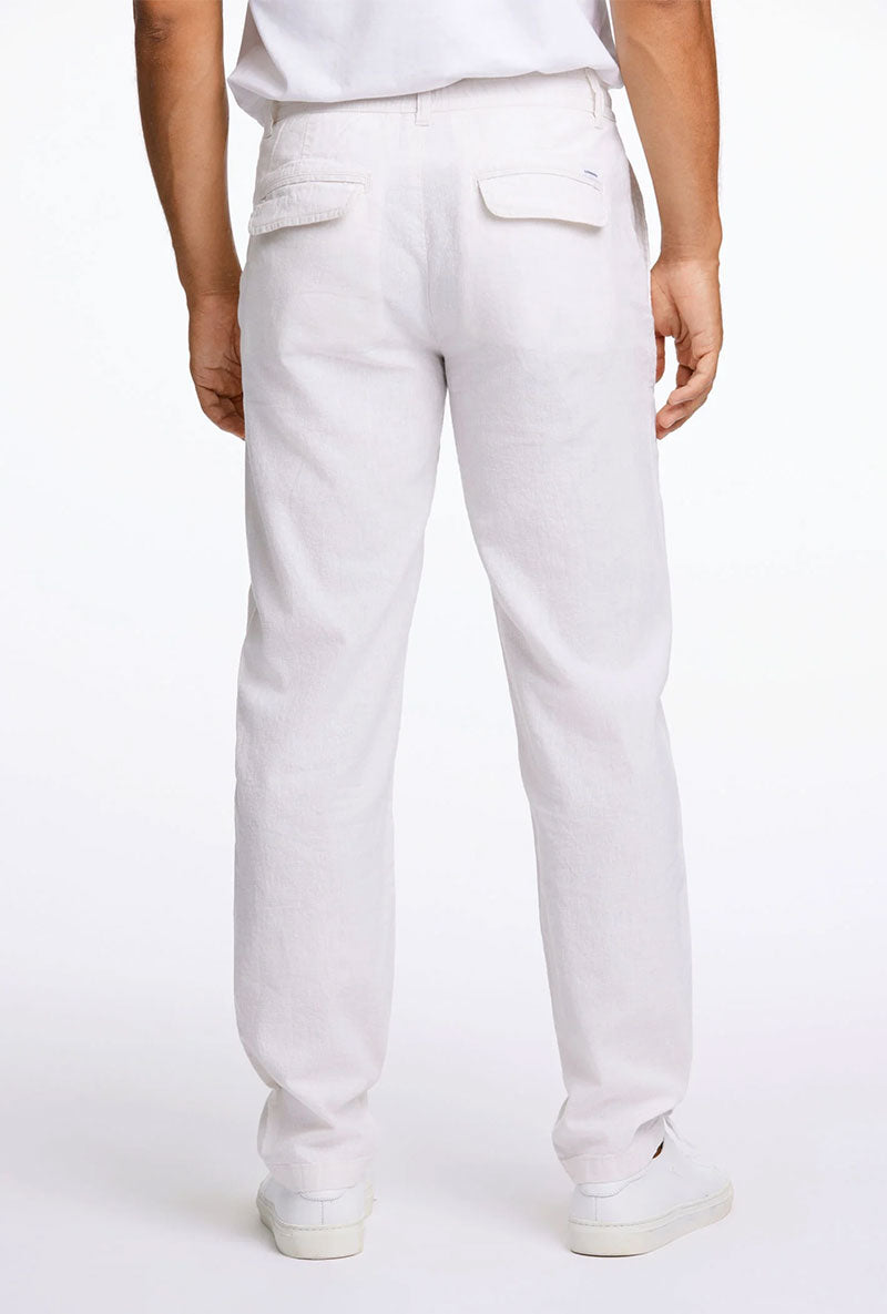 Back image of a model wearing Relaxed fit linen trousers in white, by brand Lindbergh