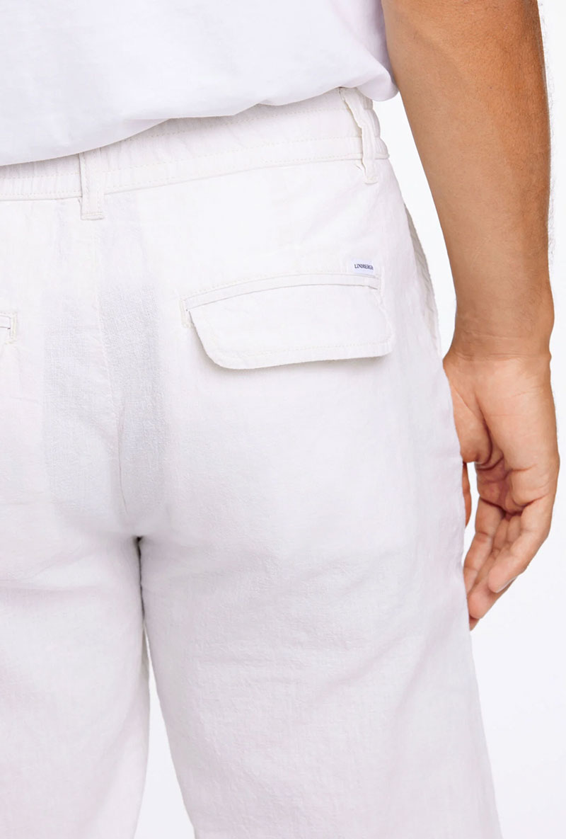 Back detail image of Relaxed fit linen trousers in white, by brand Lindbergh