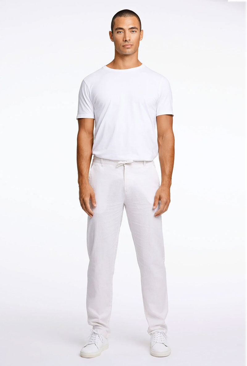 Front image of a model wearing Relaxed fit linen trousers in white, by brand Lindbergh