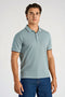 Front image of a model wearing S/s contrast polo in aqua, by brand Lindbergh