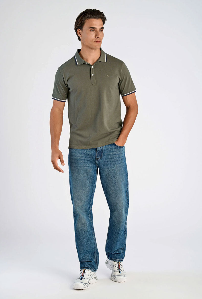 Front image of a model wearing S/s contrast polo in khaki, by brand Lindbergh