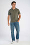 Front image of a model wearing the S/s contrast polo in khaki, by brand Lindbergh