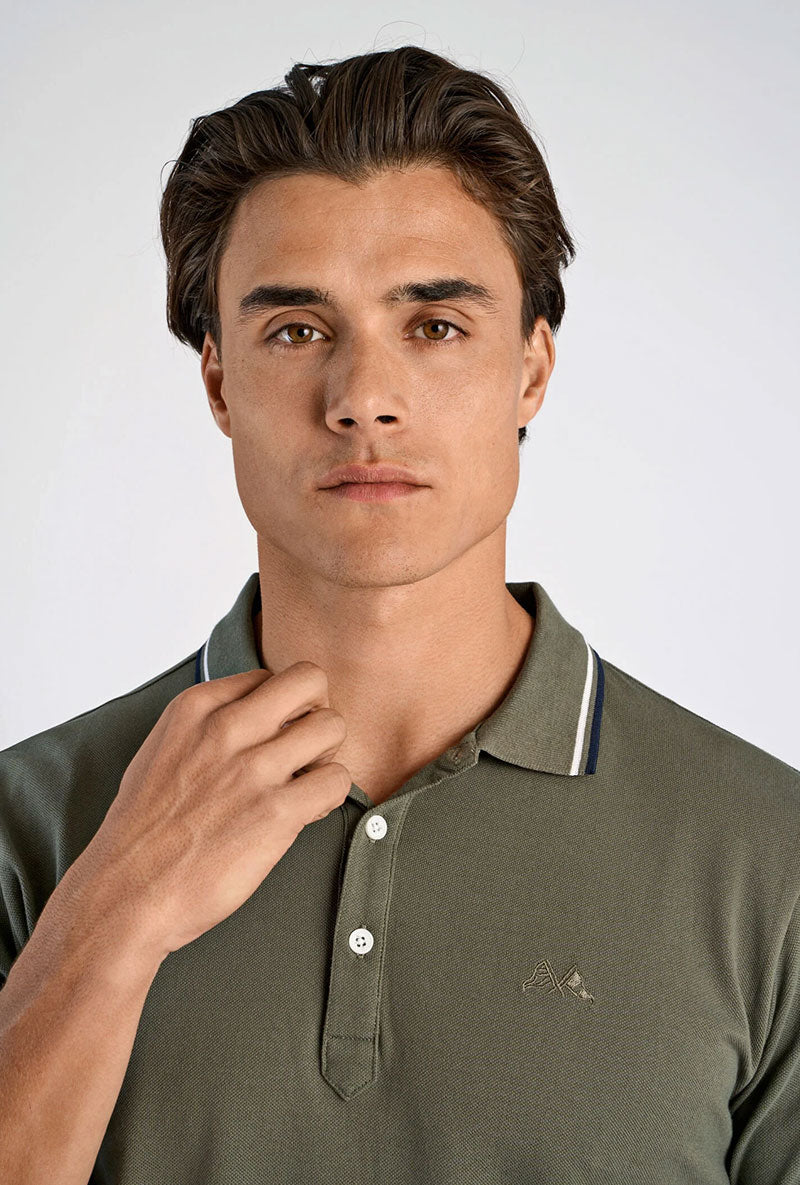 Front image of a model wearing S/s contrast polo in khaki, by brand Lindbergh