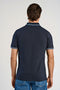 Back image of a model wearing the S/s contrast polo in navy, by brand Lindbergh