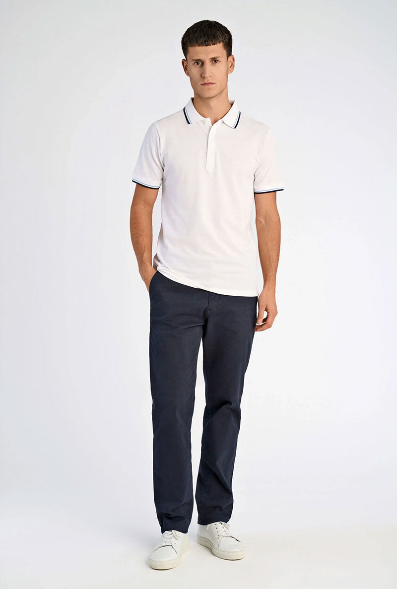 Front image of a model wearing S/s contrast polo in white, by brand Lindbergh