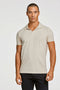 Front image of a model wearing Stretch s/s polo shirt in stone, by brand Lindbergh