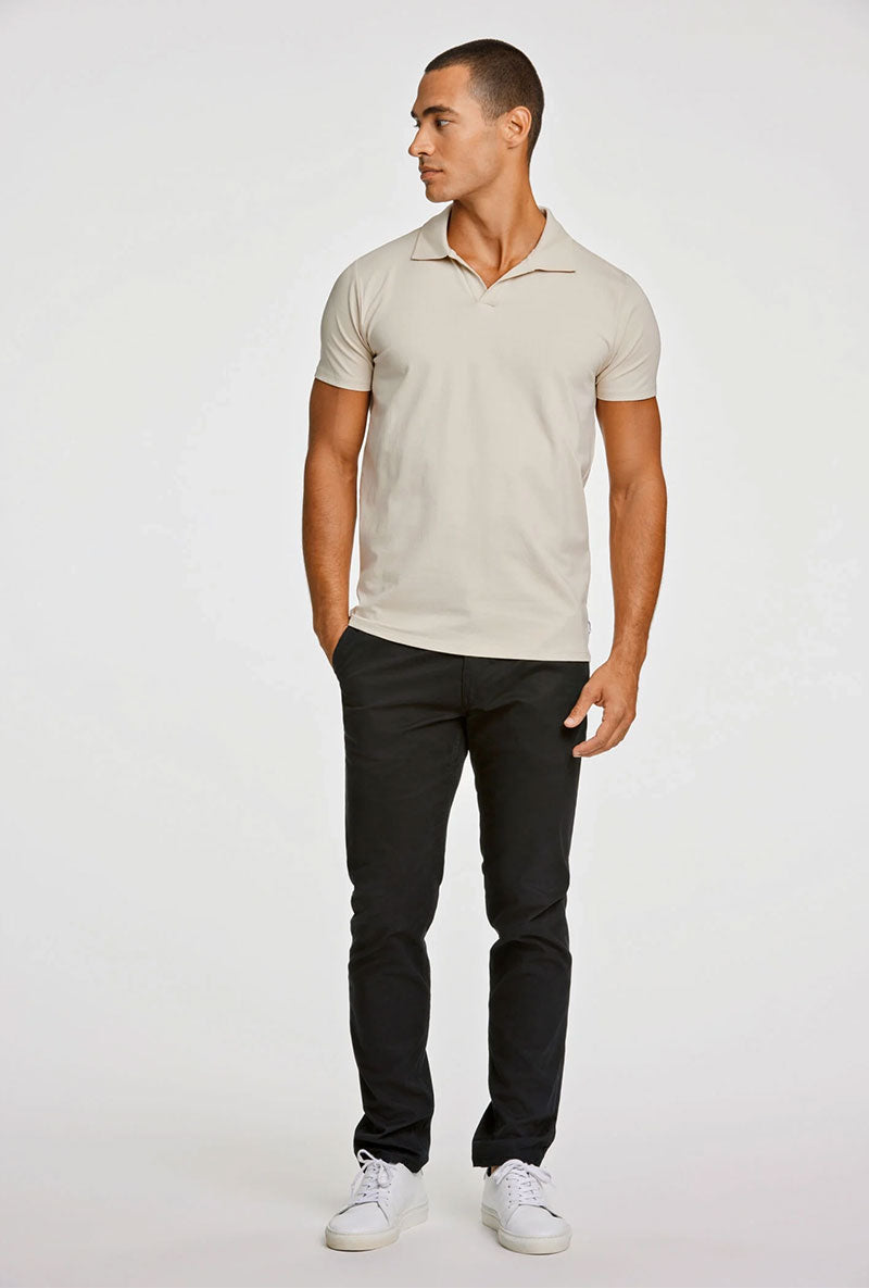 Front image of a model wearing Stretch s/s polo shirt in stone, by brand Lindbergh