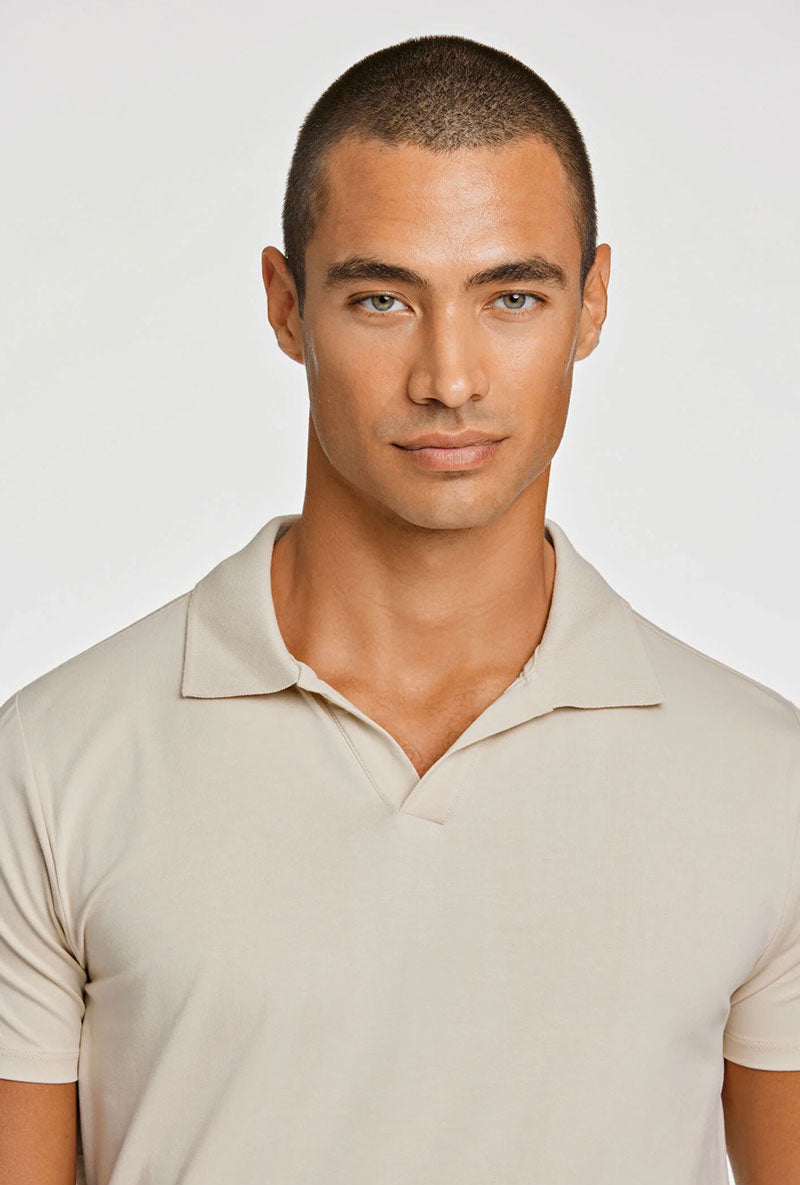Front image of a model wearing Stretch s/s polo shirt in stone, by brand Lindbergh