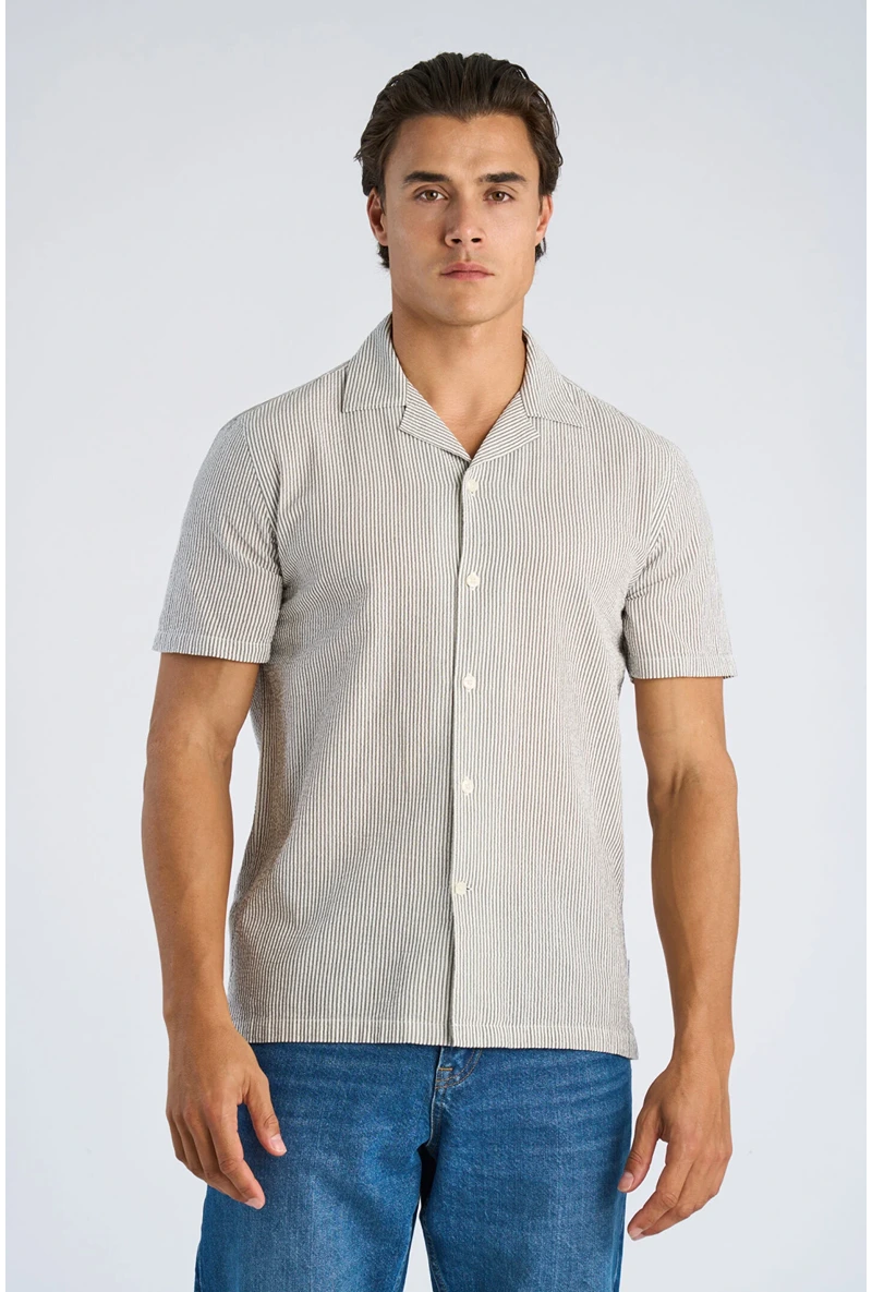 Front image of a model wearing Striped seersucker shirt in stripe, by brand Lindbergh