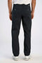 Back image of a model wearing the Superflex relaxed fit chino pants in black, by brand Lindbergh
