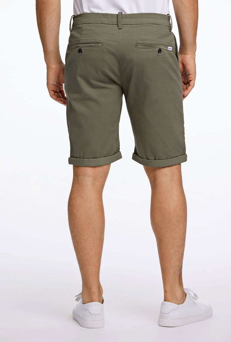 Back image of a model wearing Superflex relaxed fit chino shorts in khaki, by brand Lindbergh