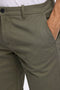 Front detail image of a model wearing the Superflex relaxed fit chino shorts in khaki, by brand Lindbergh