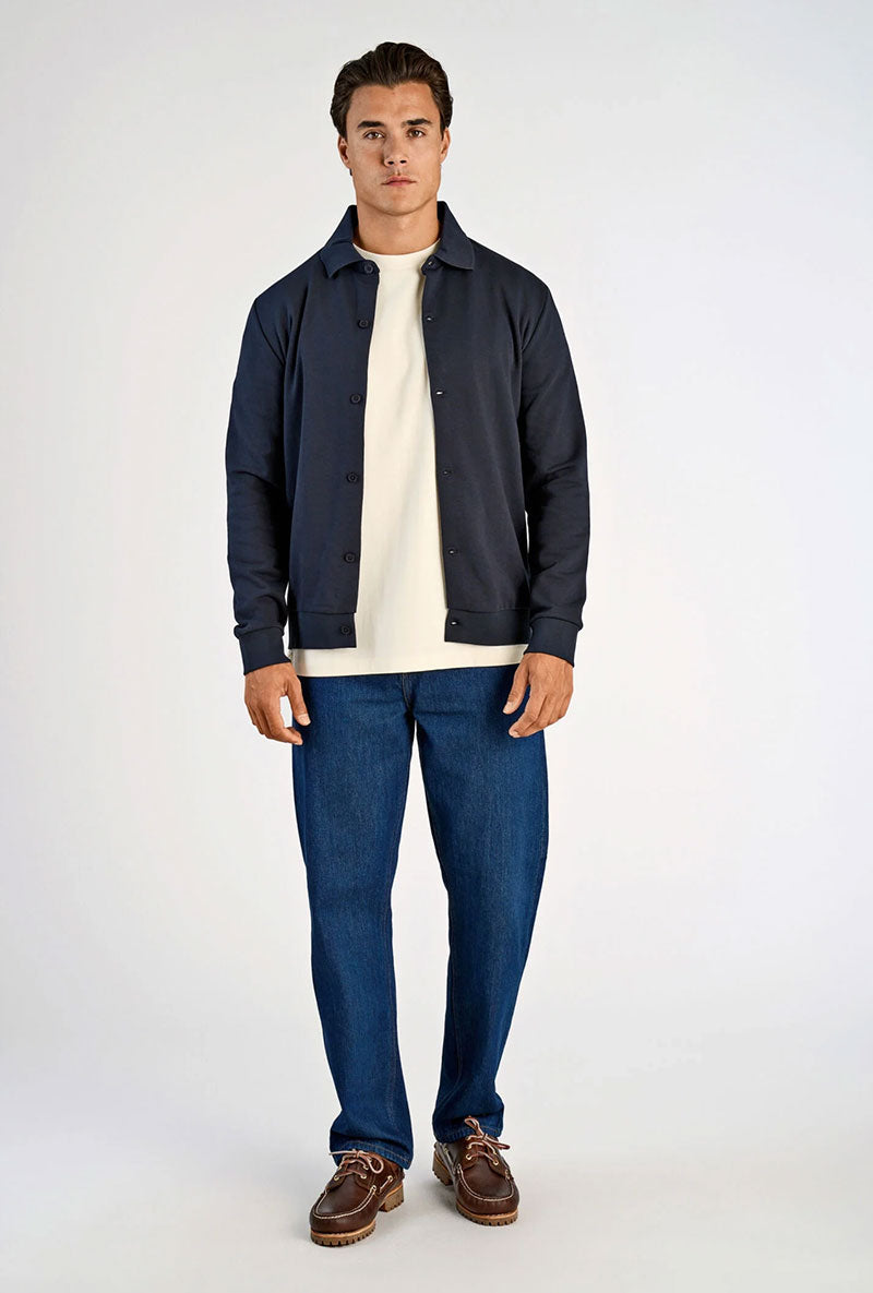 Front image of a model wearing Lindbergh sweat cardigan in navy, by brand Lindbergh