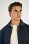 Front image of a model wearing the Lindbergh sweat cardigan in navy, by brand Lindbergh