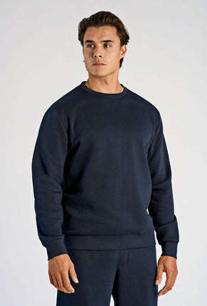 Front image of a model wearing Lindbergh sweatshirt in navy, by brand Lindbergh