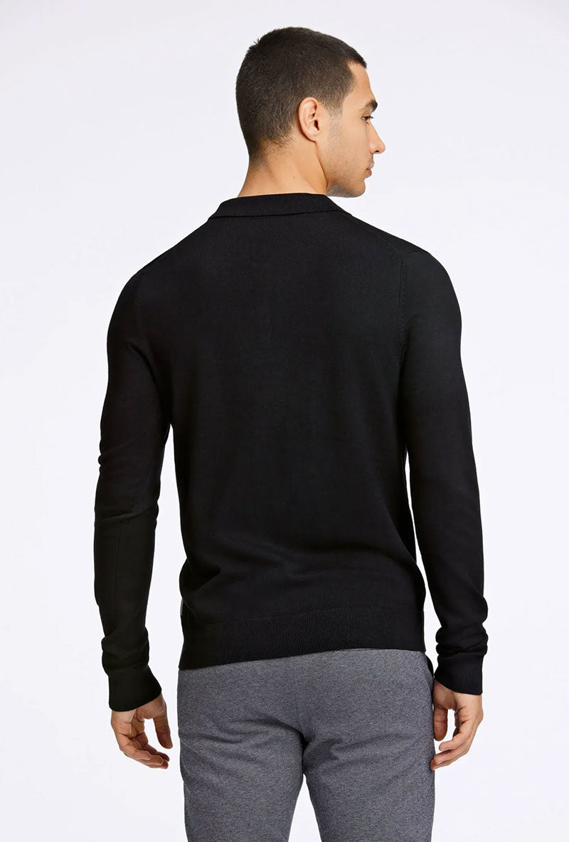 Back image of a model wearing Ecovero ls polo in black, by brand Lindbergh