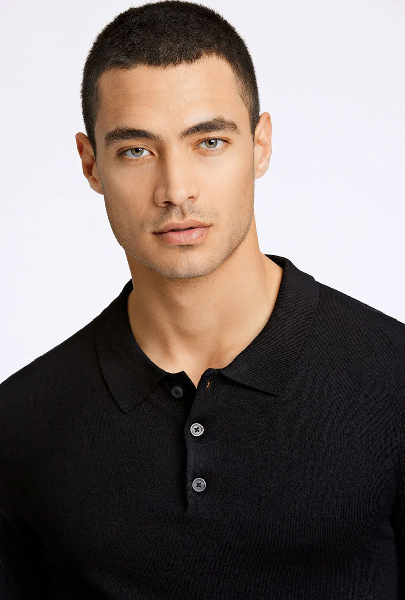 Front image of a model wearing Ecovero ls polo in black, by brand Lindbergh